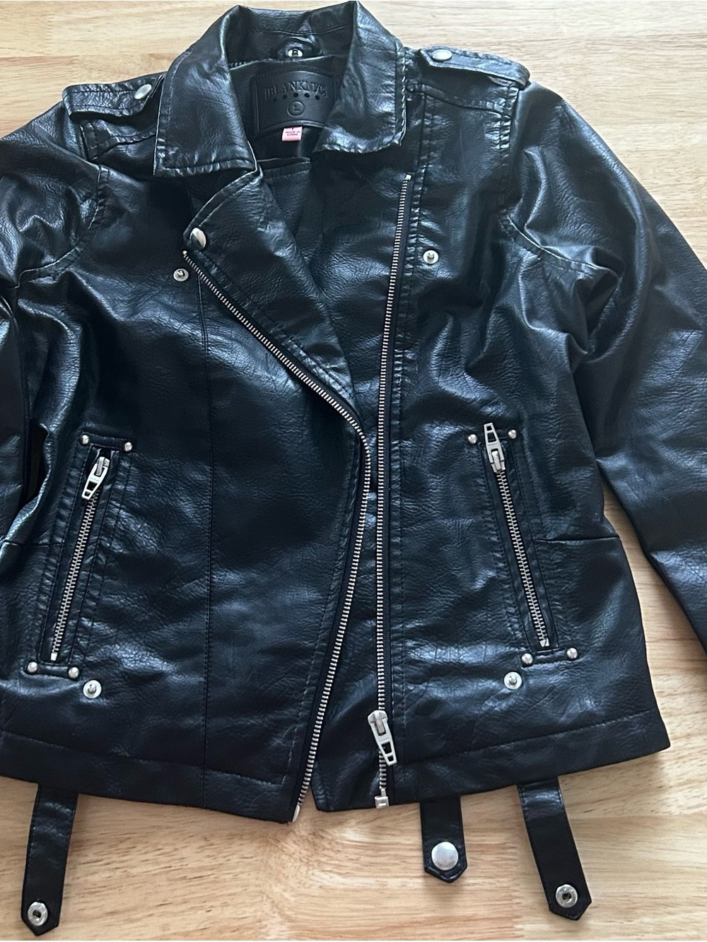 Blank NYC Black Faux Leather Moto Jacket with Silver Hardware Accents